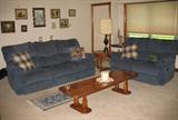 View of La-Z-Boy Sofa & Loveseat w/pedestal coffee table. Each sofa hase 2 seperate recliners built in.