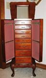 Jewelry Armoire showing Raised Top Mirrored Lid and Open Side Doors - Necklace Storage
