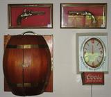 Keg Liquor Cabinet shown with Coors Clock and pair of Vintage Pistol Plaques