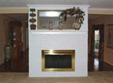 View of Fireplace from Living Room. Fireplace is double sided creating 2 seperate fireplaces; One in the dinning room and one in the living room.