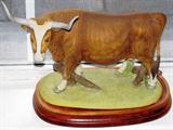 Andrea by Sadek Bisque Porcelain Longhorn Steer Figurine on wooden base