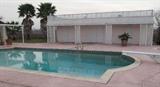View of Pool with Pool House