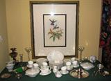 Antique 1800's Cherub Lamp (oil converted to electric), Crystal 10" Candle Sticks with Heisey Crystal Candle Bowl Inserts, "Thistle Down" by Royal Doulton China: 14 - 5 piece place Settings: Dinner Plate, Salad Plate, B&B Plate, Cup & Saucer - Serving Pieces: Platter 13.5", (2) Covered Vegetable Casserole, Gravy Boat & Underplate, Creamer & Sugar Bowl. Various Silver Plate Serving Pieces including Punch Bowl Ladle, Chip & Dip, Bon-Bon Dishes, etc.