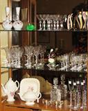 Veiw of inside china cabinet showing Victorian Vases, Tiffin stems, Cambridge "Croesus" Crystal Stemware, Fostoria "Fire Light": Wine Clarets, Liqueurs & Chapagnes shown with Lenox Magnolia Floral Figurine, Spodes Jewel "Billingsley Rose" Copeland England U.S. Patent June 1926: Coffee Pot, Tea Pot and Square Vegetable Bowl, Square Cut crystal Decanter, Daum Free Form Crystal Heart Dishes (2), Tall Muticolored Champagne Flutes
