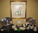 Table Filled with Silver & Porcelain: Silver PLate 21" Oval Divided Meat Tray and a Rogers Silver Plate Footed Meat Tray, Fostoria etched Sherbets #212, "Mayfair" by Thomas China Company: 9 Dinner Plates, Sugar Bowl, Creamer (2), Gravy Boat with Attached Underplate, Oval Veggie Bowl, 1 Cup & Saucer, Henrich Victorian lidded Bullion Cup & Saucer, Westmoreland handpainted Milk Glass Basket and Winterling Individual Ashtrays (5)