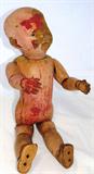 Antique Schoenhut Wooden Jointed Doll Pat. Jan. 17, 1911. Albert Schoenhut & Co in Philadephia, PA (1872 - 1930's) The Doll is all wood with spring joints. The holes in the bottom of the feet was to fit in a stand.