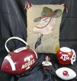 Small Portion of Texas A & M Aggie Memorabilia:  Left to Right - Vintage Aggie Plastic Football Purse, “Old Sarge”  Hand Painted Khaki Pillow, Koozie, Porcelain  Football Bank & in the center is an Aggie Football Player Figurine