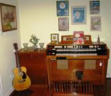 Wulitzer Organ Patten #2695386  SN602185, Leslie MDL 4460 Speaker MDL #145-147 and Vintage Vega Guitar - above: framed vintage Music Sheets