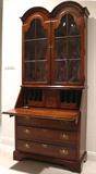 Jasper Cabinet Co. Cherry Drop Front Secretary with 3 lower Drawers Below Double Arched Door Cabinet.  Each Door has 6 Convex Glass Panels.  Open Desk View