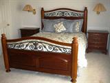 Sumter Cherry with Wrought Tron Accent Trim Queen Size Bed.  Also Shown ae 2 each Sumter Cherry 3-Drawe Night Stands