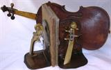 Violin Neck  Brass Bookebds shown with 1915 "Second Year Music" by Hollis Dann and "Song Reader" By McLaughlin and Gilchrist with Antique Piolin in Background