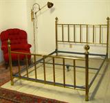 Brass King Size Bed Frame, Brass Wall Mount Swing Arm Lamp and Red Tufted Back Easy Chair
