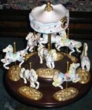 Scarborough Fair 9 piece Carousel with 24K Gold Plated Base: Musical Carousel, 7 Horses and 1 Unicorn