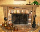 Fireplace with Antique Gun and collecrtion of brass & copper