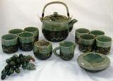 Japanese Hand Painted Glazed Shadow Cut Tea Set: Teapot, 8 Tea Cups, Sugar & Creamer.
Also shown 1 of 2 Ashtrays