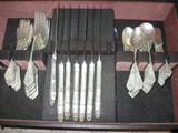 Wallace "Rosepoint" Sterling. Service for 12: Dinner Knives with Silver plate blades, Dinner Forks, Salad Forks, Teaspoons, Round Soup Spoons, and flat butter Spreaders.