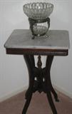 Marble Top Victorian Style Table with a Two Tier Crystal Bowl with Silver Prate Stand.
