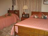 Children's Room showing Owosso Mid-Century Full Bed and bookcase headboard twin Step top Matching End Table
