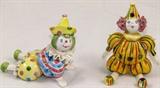 Handmade in Italy for Gumps:
Clown on Tummy  (3"H x 5"W)
Jointed Porcelain Clown Doll