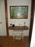 Wrought Iron Sewing Machine Base Table shown with original Art Work by Local Artist Mary Stiles