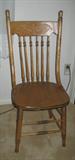 1 of 2 Antique Oak Spindle/Pressed back chairs.