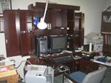 Over All View of Office with Mahogany Stained Computer Desk with Fold out Storage Doors