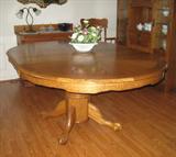 Claw Foot Round Pedestal Oak Table shown with 24" Leaf. OVer All 48"W x 72"L