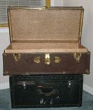 Metal Trunk with Tray resting on top of a Great Black Paint Square Wood Trunk with metal findings