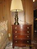 One of a pair mahogany 4 drawer bracket feet end table
also show is 1 of a pair of Steiffel solid brass lamps
