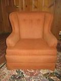 One of a pair Ethan Allen burnt orange easy chairs