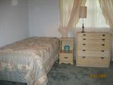 Drexel Mid-Century 5-Drawer Chest & 1-Drawer Night Stand show with Candle Stick Lamp and 1 of 4 set of Stearns & Foster Twin Mattress Sets