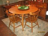 Tell City Hard Rock Maple Round Table w/2 Leaves and 6 Chairs. Shown with California Pottery Lazy Susan