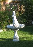 One of Several Birdbaths. This one feature an alert Tall Rabbit in the center.