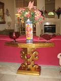 Gold Leaf Finished Console Table featuring Canberry Art Glass and Hand Painted Vase.