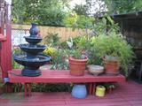 Four Tier Fountain, Wood Bench and Planters