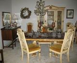 Classic Italian renaissance Design. Rich detailing enhances the grandeur of this ensemble with gold-accented Antique Ehite on Pecan Veneers w/rich fruitwood veneer top. Table is 44x66" extending to 84" with leaf.
