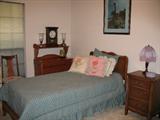 VIew of Guest Bedroom. Furnish in Drexel French Provenial Style Furniture including twin Bed & Night Stand. Background Custom Built by Local Furniture maker Solid wood Dry Sink