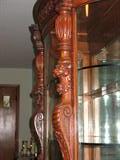 Carving of Lions on China Cabinet