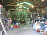 The Barn Inside before work begins. WHAT IS ALL THIS STUFF!!!!!