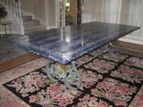 Lapis Table top (8'2" x 4'7") inlaid in beautiful a shades of blue & brown Lapis. Table top is set on an iodize metal base with Brass accents.
