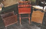 3 of several depression era Magazine Racks