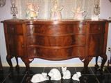 Beautiful Serpentine Front Sideboard on cabriole legs ending in ball-in-claw feet. Mahogany construction of solids and veneers.