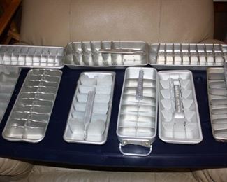 There are about 1 dozen Aluminum Ice Trays