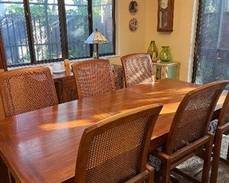 French provincial dining table and 5 cane chairs (some damage)