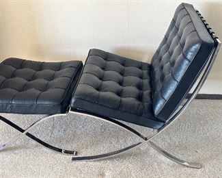 Knoll Barcelona Chair and Ottoman. Awesome set in very good condition with light wear. 

Manufactured in 2000. 

Measures about 29.5" x 31" d x 30.25" h . There are two of these in this auction. 