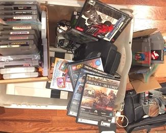 Video games, 3 NES Systems, 1 N-64 system, 16 NES games, 3 N-64 games, 12 PS 1&2 games.