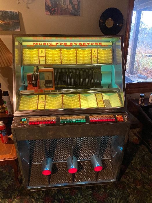 Seeburg Select-O-Matic 200 Jukebox 
(It’s in great shape, needs a “tuneup”)
Come take a look!  It’s already loaded and we have a couple extra boxes of records as well. 1958 Seeburg Model 201 DH.  Lot’s of chrome, taillights are designed to look like a 57’ Chevy or Cadillac Eldorado.  