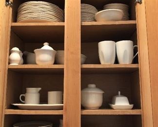 Cabinet Full of White Dishes