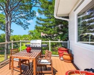 Amin Level/Porch
Teak table with 2 chairs 
Large ceramic and terra cotta pots