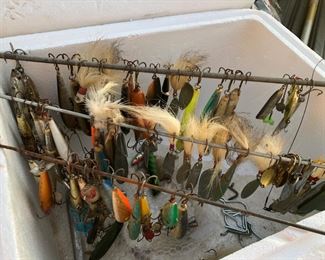 Garage Fishing Gear 
Used lures, salt and fresh water.  A lot are hand made, hand tied.  Please note there are NO antique wood lures with glass eyes.  Resin, wood, lead, steel, feathers and deer tails.  